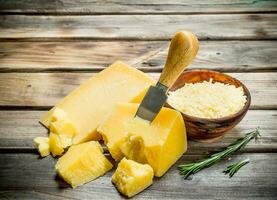 Grated Parmesan cheese in bowl. photo