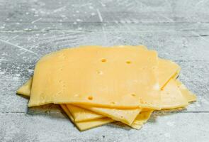 Thin slices of cheese. photo