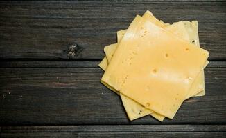 Thin slices of cheese. photo