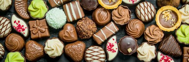 Chocolates candies with different fillings. photo