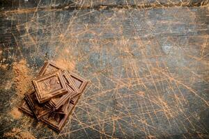 Chocolate slices with cocoa powder. photo