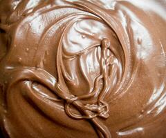 Chocolate paste in bowl . photo