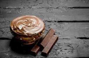 Chocolate paste in bowl . photo