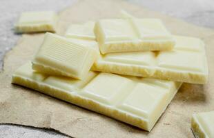 White chocolate on paper. photo