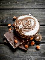 Chocolate paste with hazelnut. photo