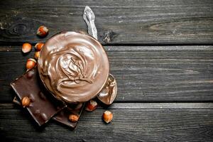 Chocolate paste with hazelnut. photo
