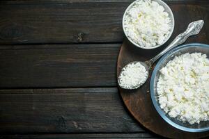 Cottage cheese in bowl . photo
