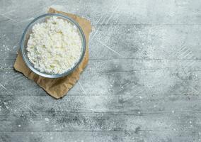 Cottage cheese in bowl . photo