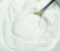 Fresh sour cream texture . photo