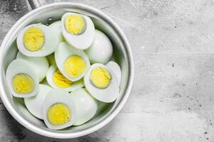 Boiled eggs in a saucepan. photo