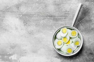 Boiled eggs in a saucepan. photo