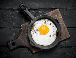 Fried egg in a frying pan. photo