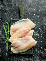 Fish fillet with rosemary. photo