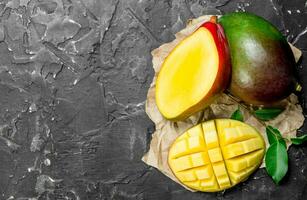 Fragrant ripe mango on a napkin. photo