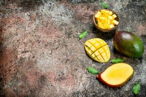 Pieces of ripe mango in bowl. photo