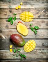 Pieces of mango with foliage. photo