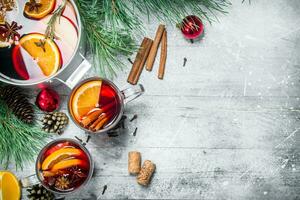 Christmas hot mulled wine with aromatic spices. photo