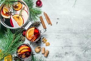 Christmas hot mulled wine with aromatic spices. photo
