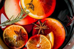 Mulled wine with fir branches. photo