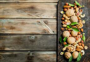 Nuts background. Different Range of natural nuts . photo