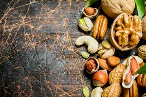 Nuts background. Different Range of natural nuts . photo