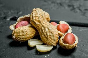 Peanuts with shells . photo