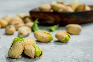 Pistachios with leaves. photo