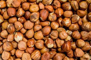 The texture of the shelled hazelnuts. photo