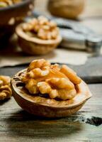 Shelled walnuts with a Nutcracker. photo