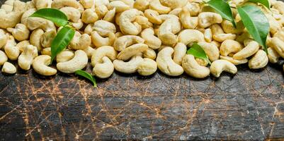 Cashew. On a wooden background. photo