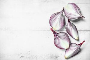 Pieces of fragrant fresh red onion. photo