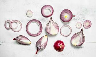 Pieces of fragrant fresh red onion. photo