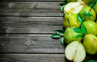 Fragrant ripe pears with foliage. photo