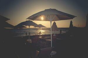 calm sunset in Trusia with views of the beach and swimming pools photo