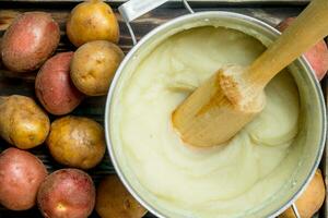 Mashed potatoes in a pot . photo