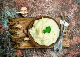 Mashed potatoes in a bowl. photo