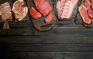 Raw meat. Different kinds of pork and beef meat. photo