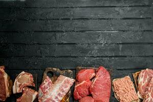 Raw meat. Different kinds of pork and beef meat. photo