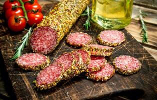 Salami with herbs and spices. photo