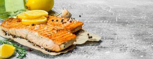 Steaks grilled salmon with lemon. photo