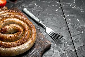 Grill sausages with spices. photo