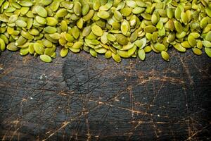 Green pumpkin seeds. photo