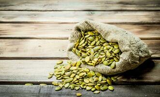 Pumpkin seeds in a bag. photo