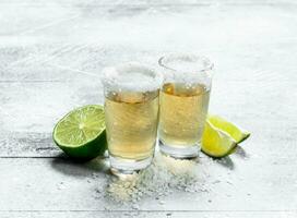 Tequila with fresh lime. photo