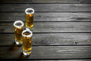 Tequila in a shot glass of salt. photo