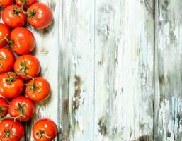 Ripe fragrant tomatoes. photo