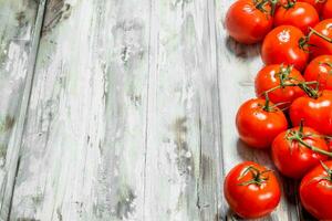 Ripe fragrant tomatoes. photo