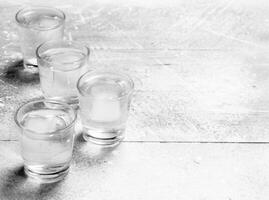 Vodka in a shot glass. photo