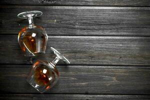 Cognac in a lying glasses. photo