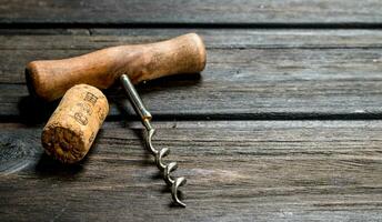 Corkscrew with cork. photo